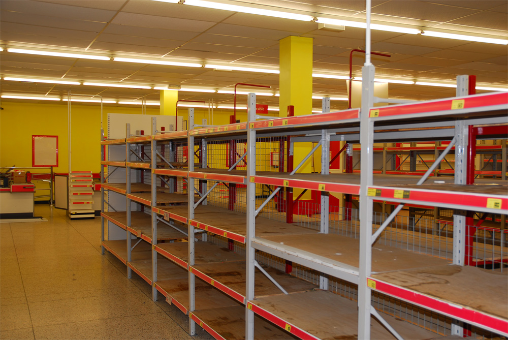 Steel Uprights, beams and MDF shelves. All heavy duty.