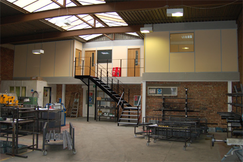This mezzanine was fitted above the existing ground floor reception and toilet area to provide four fire rated offices for their management team.