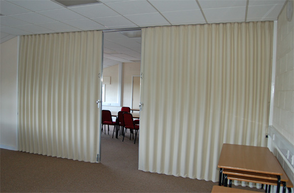 This fabric folding partition perfectly separated two meeting areas. 